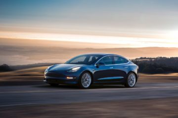 vrg tesla model 3 blue driving