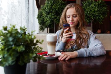 Lady Looking At Phone