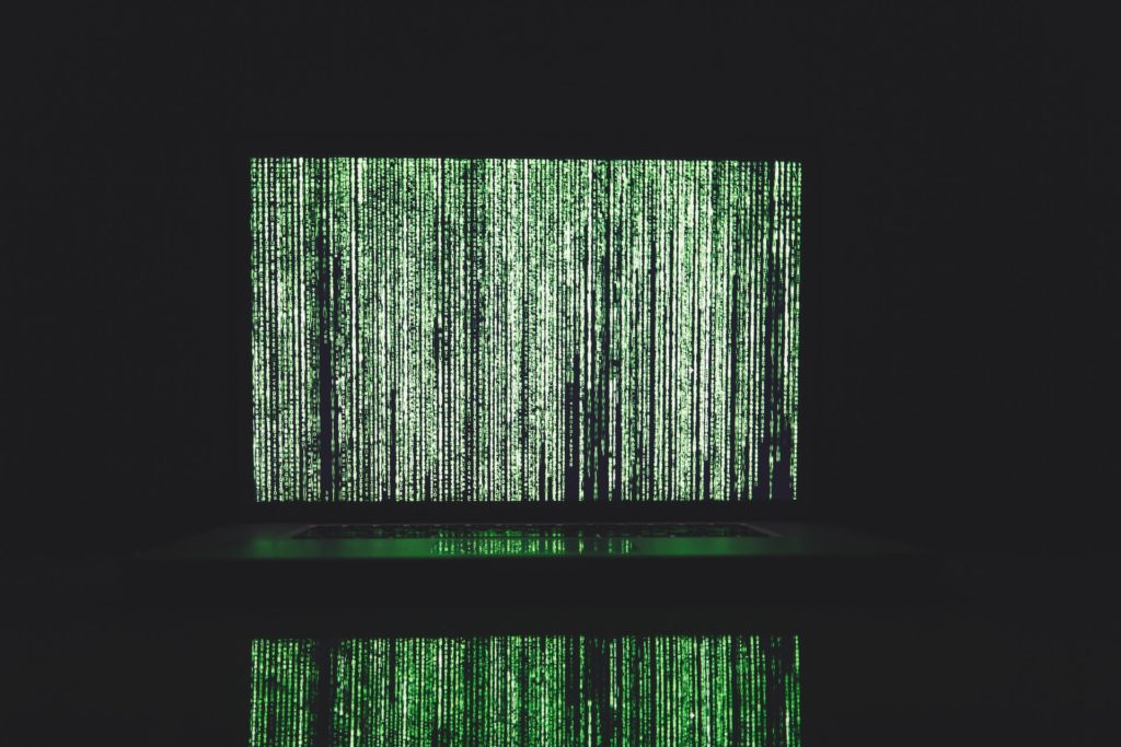 Tesla AutoPilot Predictions: 2019-2025 5 Matrix Code On Laptop