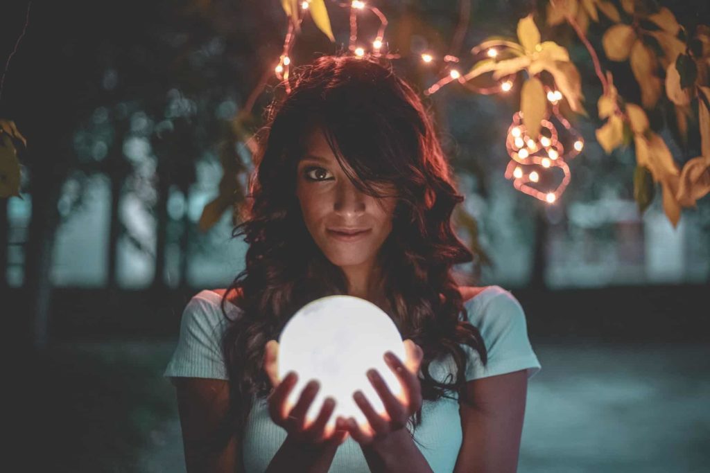 Woman Holding Crystal Ball 1